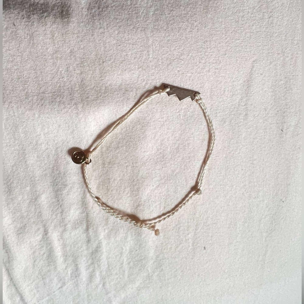 Pura Vida pink and rose gold mountain bracelet.